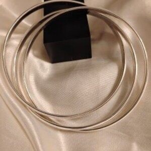 TRIPLE SILVER TONE INTERLOCKING BANGLE BRACELETS